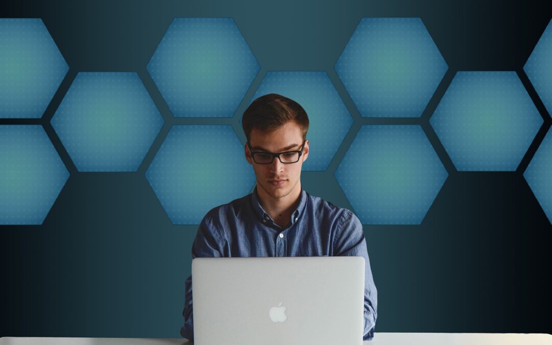 Businessman working on SEO at a laptop